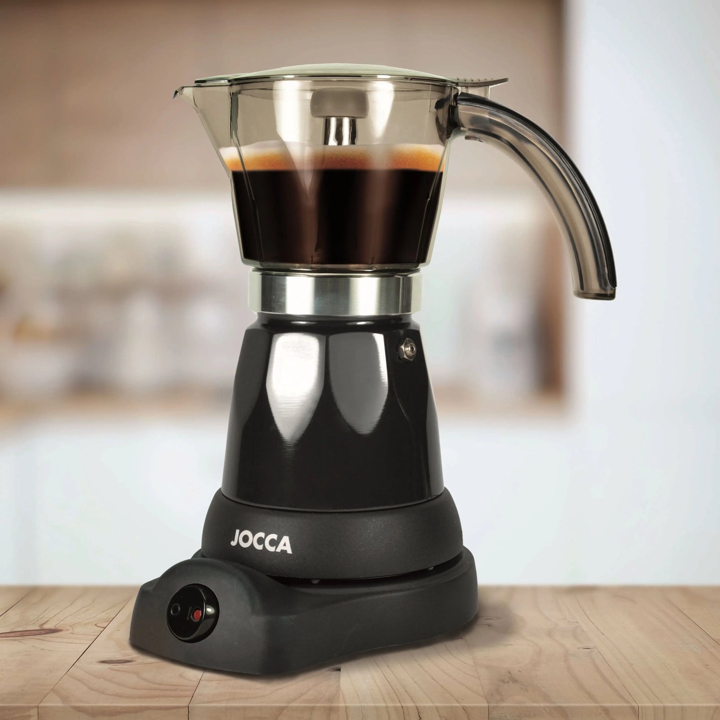 Italian Jocca coffee maker with an electric base that allows the coffee maker to rotate 360 °, a system that keeps the coffee always hot with protection against overheating, compact design, transparent jug and with a cold to